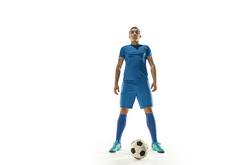 Image showing Professional football soccer player with ball isolated white background