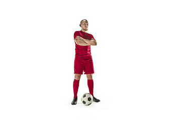 Image showing Professional football soccer player with ball isolated white background