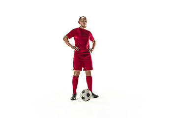 Image showing Professional football soccer player with ball isolated white background