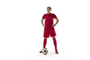 Image showing Professional football soccer player with ball isolated white background