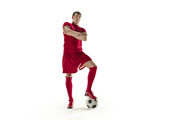 Image showing Professional football soccer player with ball isolated white background