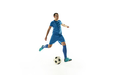 Image showing Professional football soccer player with ball isolated white background