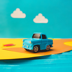 Image showing Vintage miniature car in trendy color, travel concept