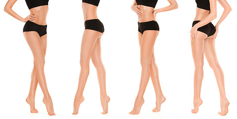 Image showing Long pretty woman legs on white background