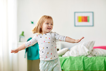 Image showing happy little girl having fun at home