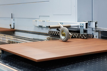 Image showing wooden board on conveyer at furniture factory