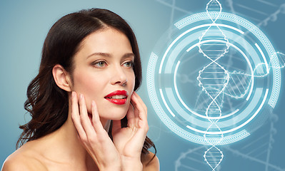 Image showing woman with red lipstick over dna molecule