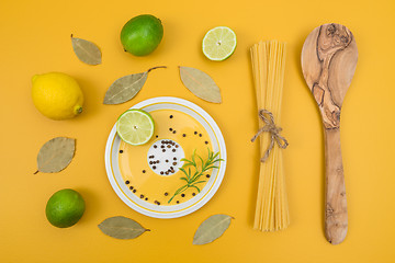 Image showing Cooking ingredients on yellow background