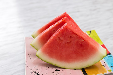 Image showing Juicy watermelon on a bright ceramic plate