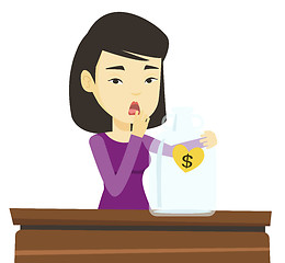 Image showing Bankrupt woman looking at empty money box