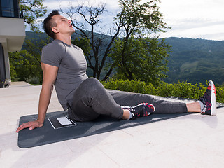 Image showing man doing morning yoga exercises