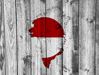 Image showing Map and flag of Greenland on weathered wood