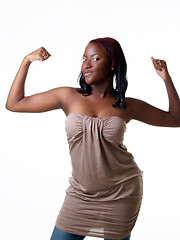 Image showing Young black teen girl showing her biceps