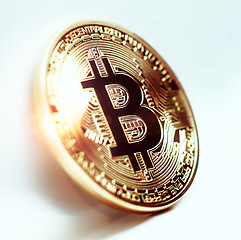 Image showing Bitcoin coin photo close-up. Crypto currency, blockchain technology