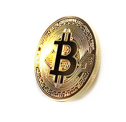 Image showing Bitcoin coin photo close-up. Crypto currency, blockchain technology