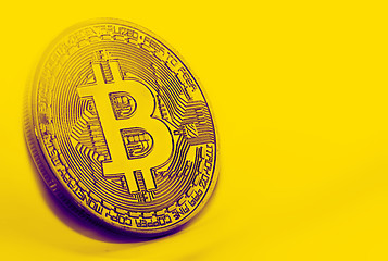 Image showing Bitcoin coin photo close-up. Crypto currency, blockchain technology