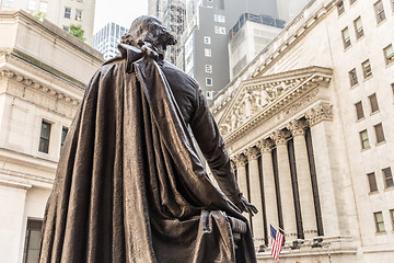 Image showing View from Federal Hall of the statue of George Washington and the Stock Exchange building in Wall Street, New York City.