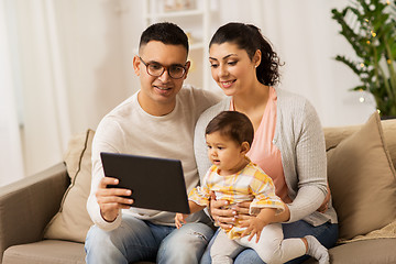 Image showing mother, father and baby with tablet pc at home