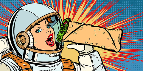 Image showing Hungry woman astronaut eating kebab Doner Shawarma