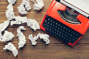 Image showing Vintage typewriter on wooden background