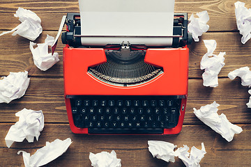 Image showing Vintage typewriter on wooden background