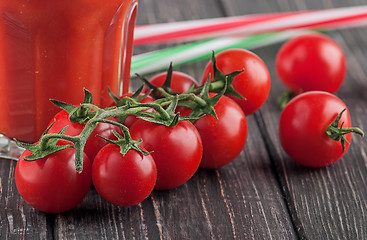 Image showing Cherry tomatoes and glass of tomato