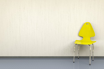 Image showing yellow chair at a wall with space for your content