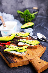 Image showing bread with cheese and with avocado 