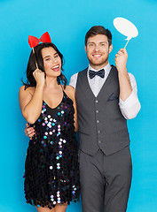 Image showing happy couple with party props having fun