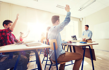 Image showing group of students and teacher with papers or tests