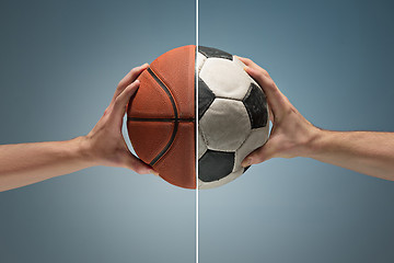 Image showing Hands holding soccer ball