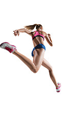 Image showing The studio shot of high jump female athlete is in action