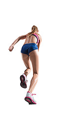 Image showing The studio shot of high jump female athlete is in action