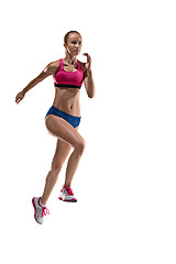 Image showing The studio shot of high jump female athlete is in action