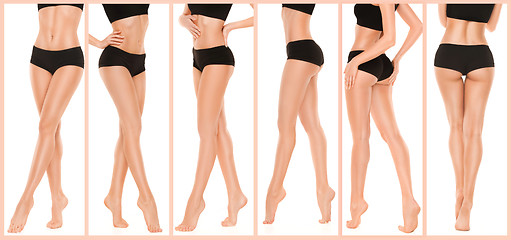 Image showing Long pretty woman legs on white background