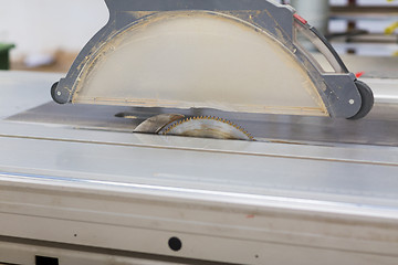 Image showing sliding panel saw at workshop