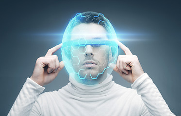 Image showing man in 3d glasses and virtual helmet