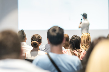 Image showing Business speaker giving a talk at business conference event.