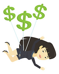 Image showing Business woman flying with dollar signs.