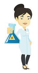 Image showing Scientist holding flask with biohazard sign.