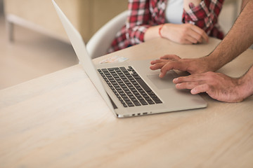 Image showing happy young couple buying online