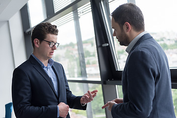 Image showing cloasing the deal in modern office interior