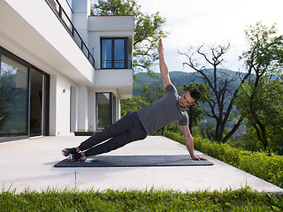 Image showing man doing morning yoga exercises