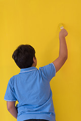 Image showing Portrait of a happy young boy painter