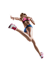 Image showing The studio shot of high jump female athlete is in action