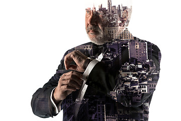 Image showing Portrait of bearded businessman. Double exposure city on the background.