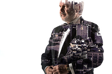 Image showing Portrait of bearded businessman. Double exposure city on the background.