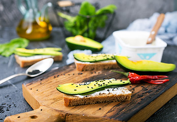 Image showing bread with cheese and with avocado 