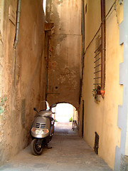 Image showing motorbike in alleyway