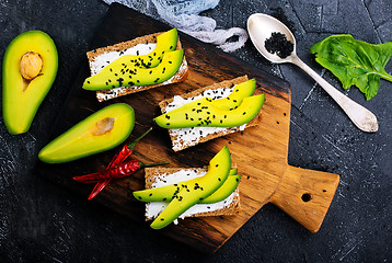 Image showing bread with cheese and with avocado 